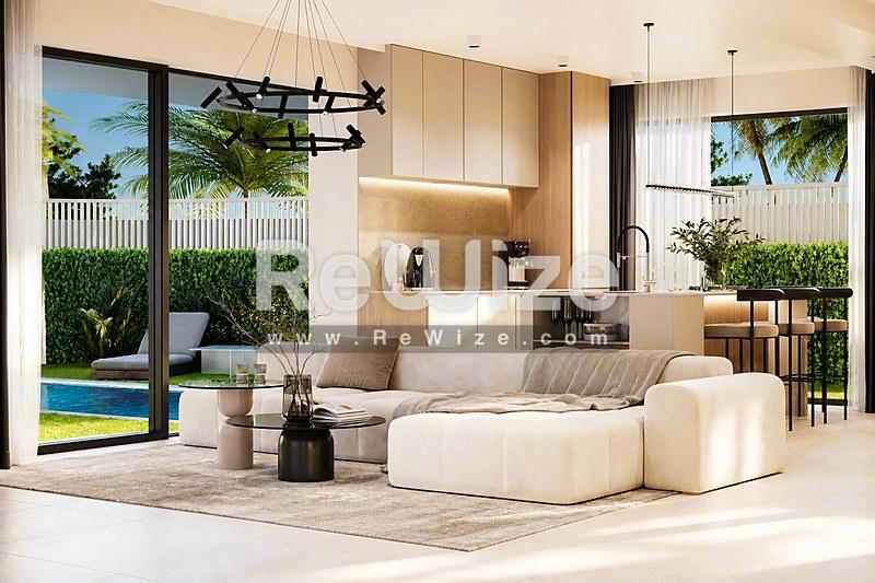 Ανοιχτός χώρος διαμονής στη βίλα Halkidiki rw-7458 με σύγχρονα έπιπλα και θέα στον κήπο.