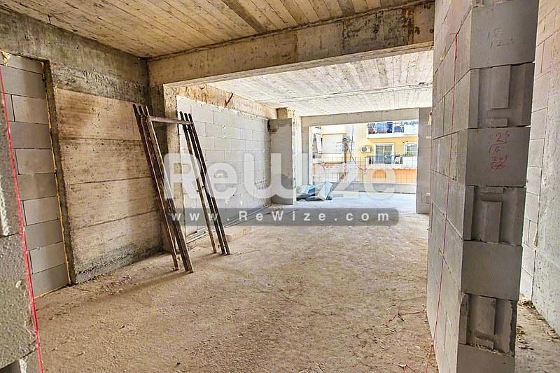 Διαμέρισμα ανοιχτής διαρρύθμισης υπό κατασκευή στη Χαλκιδική με ευρύχωρη εσωτερική διάταξη.