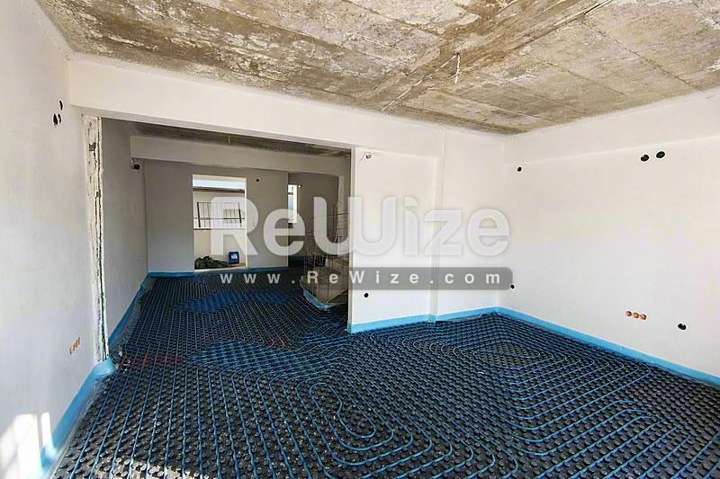 Maisonette 200 m² in Pylaia-Chortiatis, open-plan living area