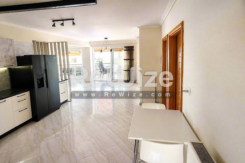 Apartment 165 m² in Kalamaria, open-plan living area