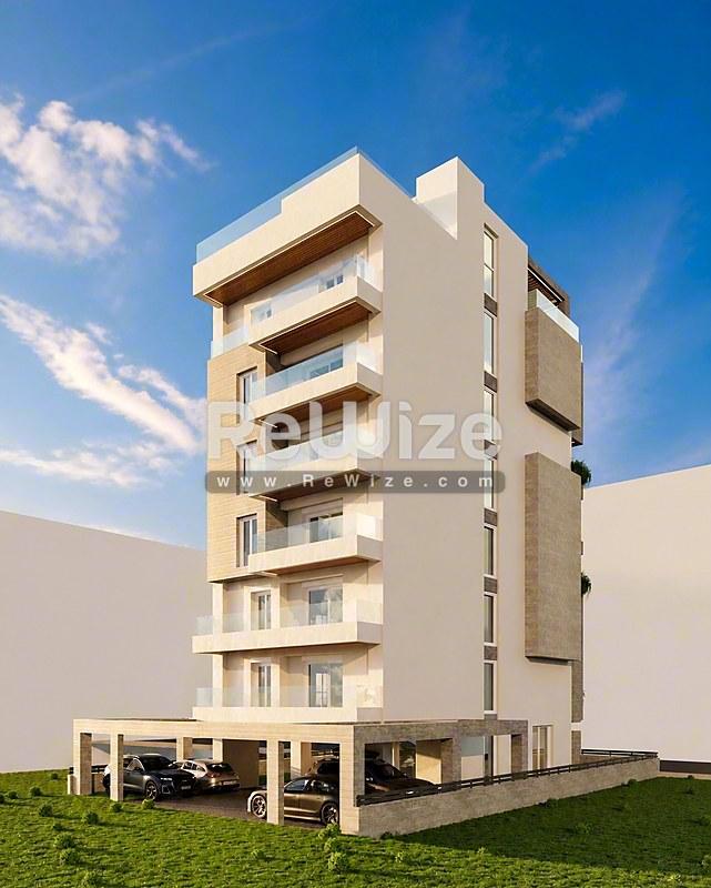 Σύγχρονο κτίριο διαμερισμάτων στη Χαλκιδική με καθαρές γραμμές και μπαλκόνια.